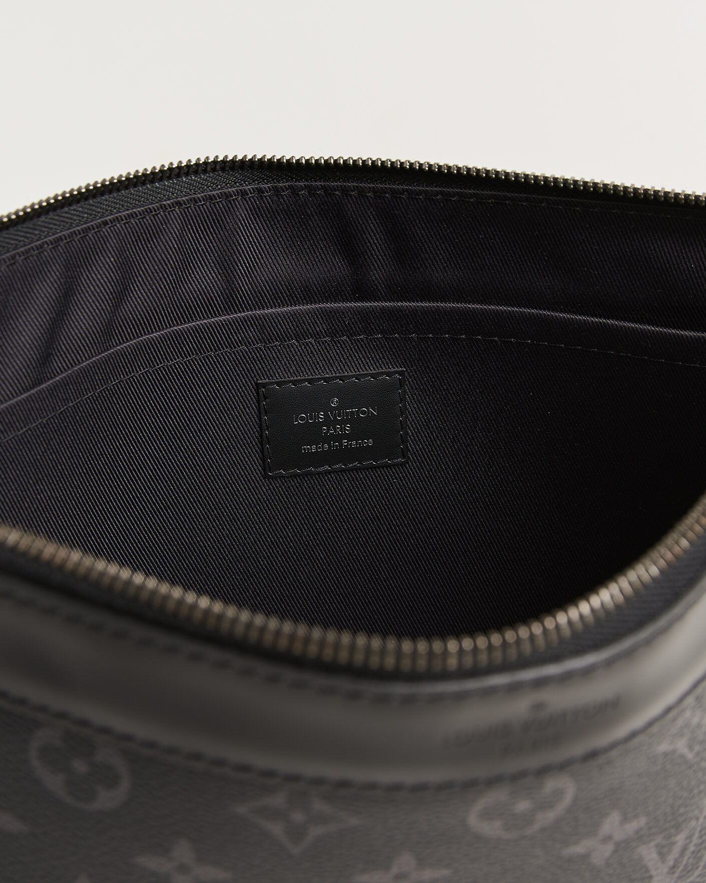 Men | Pre-Owned & Vintage Bags | Louis Vuitton Pre-Owned | Discovery Pochette Monogram Eclipse