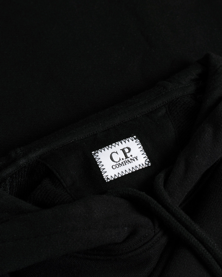 Men | Sweaters & Knitwear | Pre-owned | C.P. Company Diagonal Raised Fleece Hooded Lens Sweatshirt Black