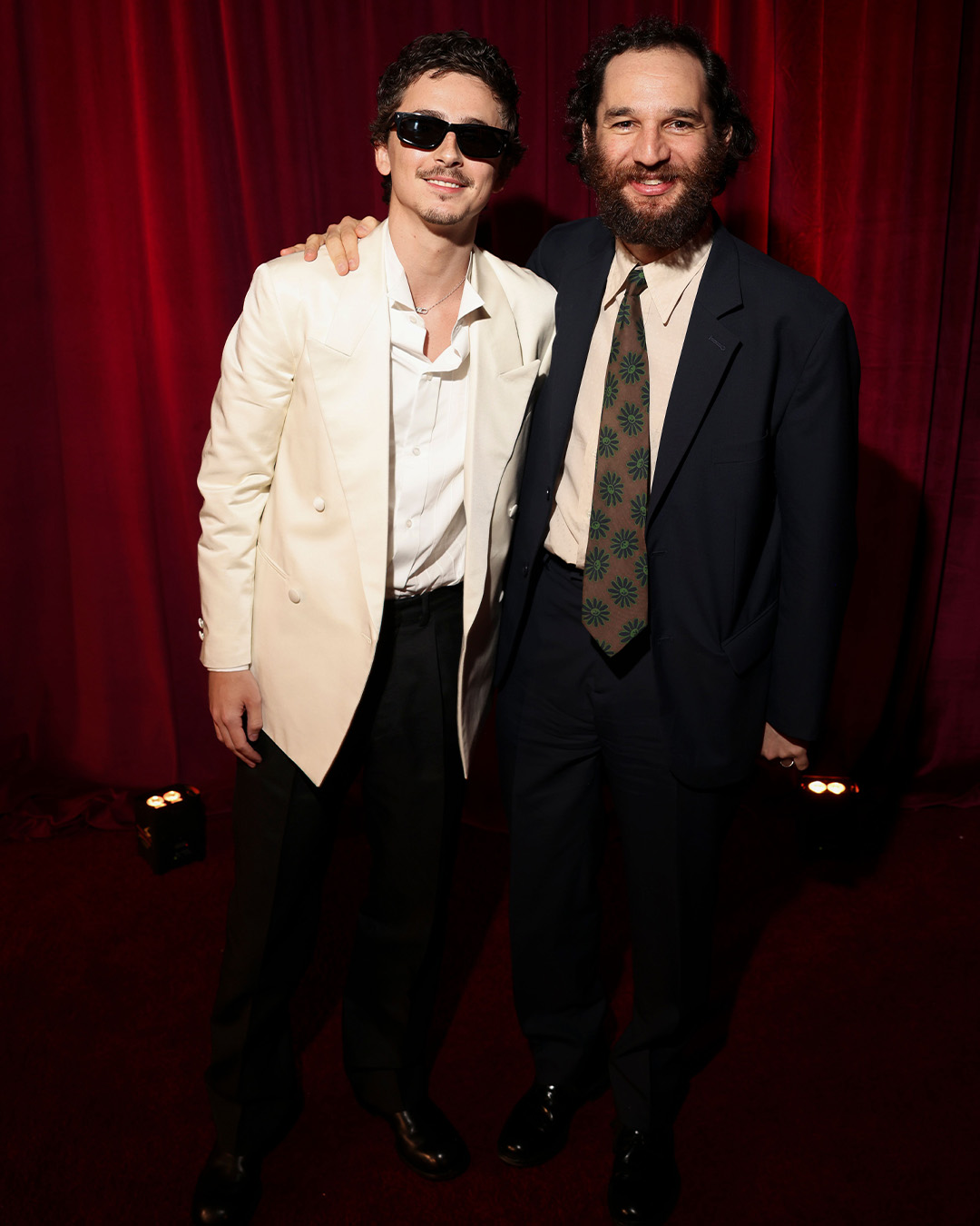 Josh Safdie and Timothée Chalamet In Prada and Christian Louboutin shoes.